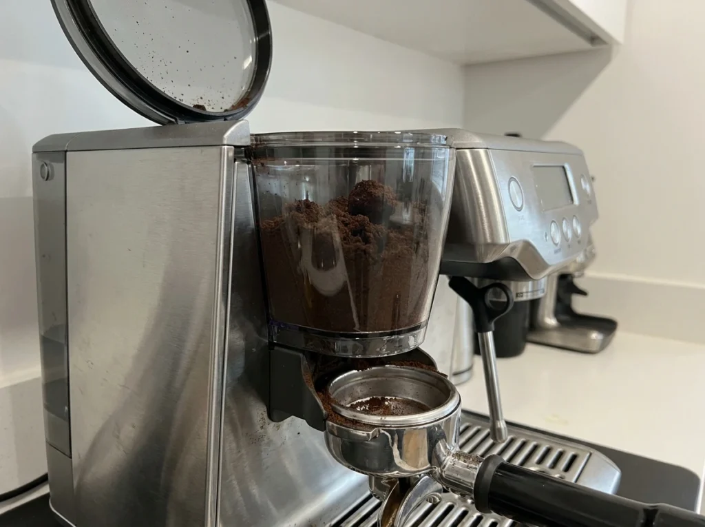 Breville BES876 retained grounds in the integrated grinder chute